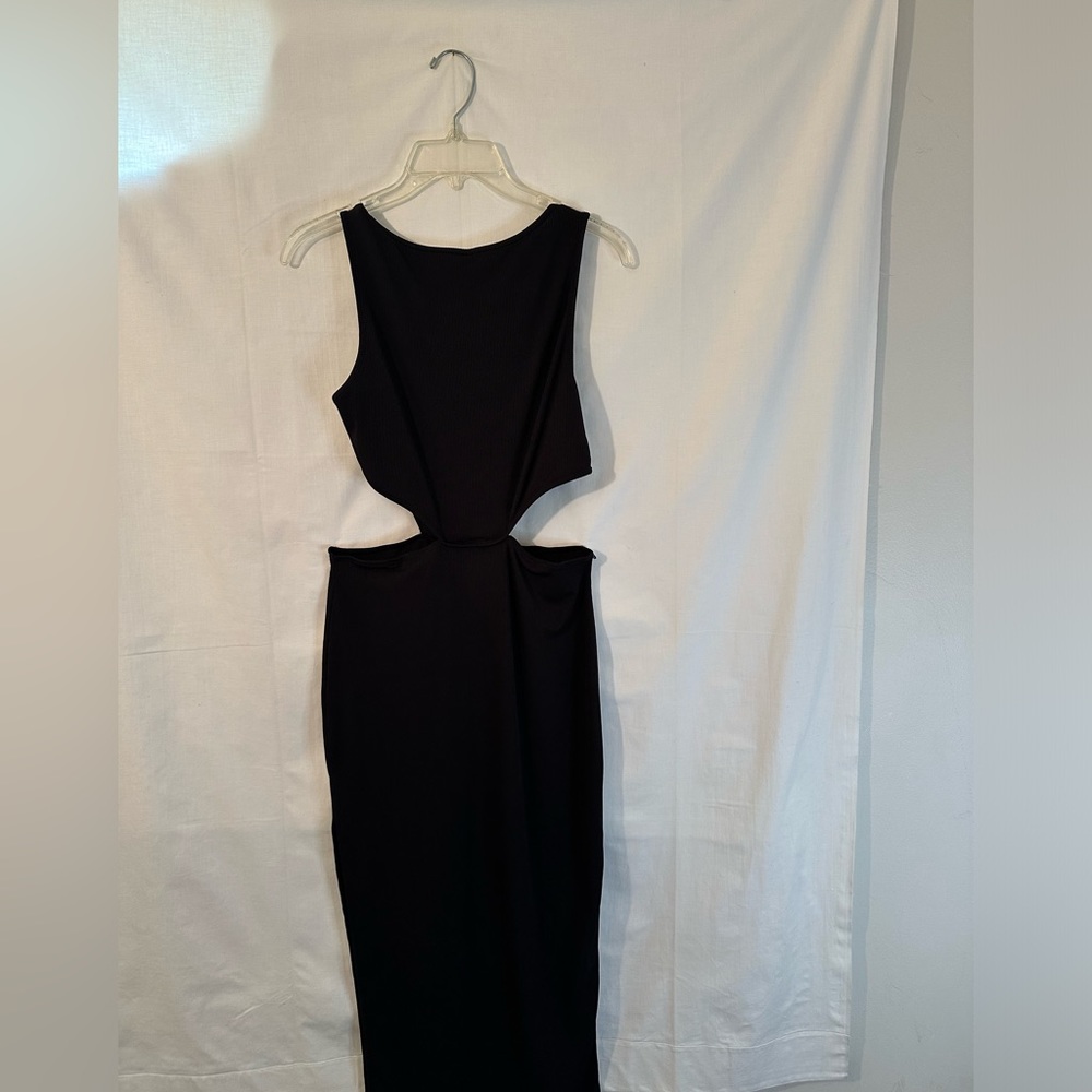 Sexy Maxi black dress with cut outs on the sides. Size medium